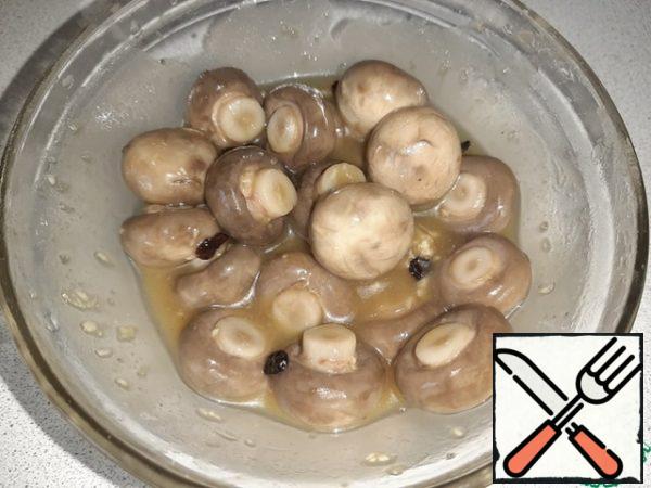 Pour the marinade over the mushrooms. Cover and refrigerate in a glass container or jar for 5 hours.