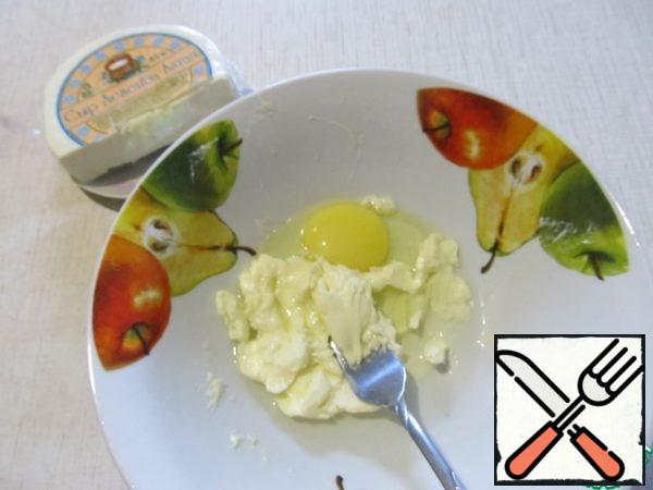 RUB the egg with 50 g of softened butter.