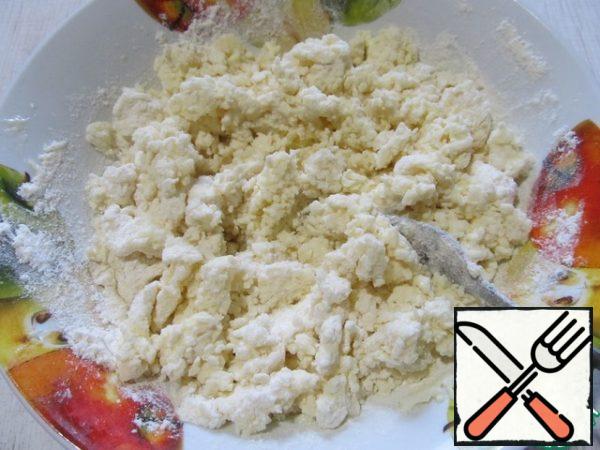 Mix the cheese, egg, butter, sugar and flour.