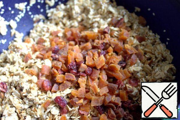 Add dried apricots and cranberries.