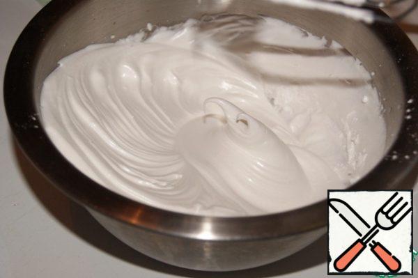 Beat until the sugar is completely dissolved. RUB the meringue between your fingers and if you don't feel the sugar, it's fine.
