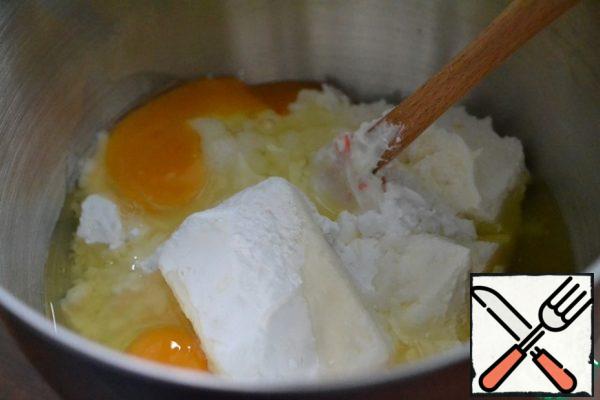 In the bowl of a mixer, beat the cottage cheese, cheese, starch, lemon zest and eggs.