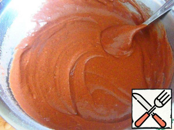 Add the flour and cocoa mixture and mix thoroughly.