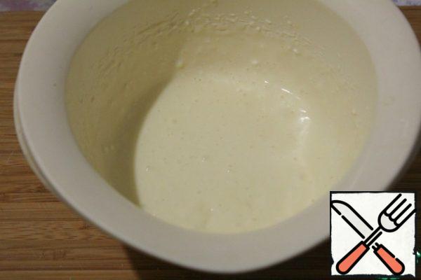 For the filling, mix the egg, cottage cheese, cheese and sugar well.