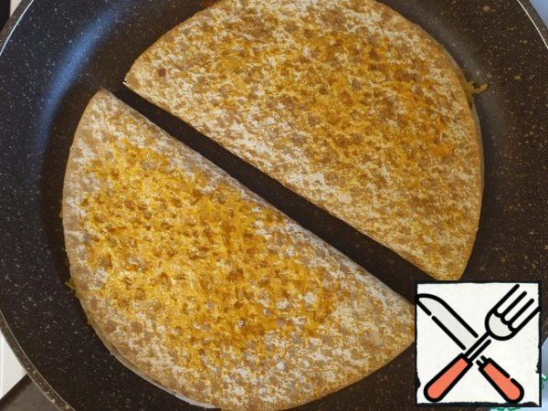 Then roll up and fry on both sides until crisp.