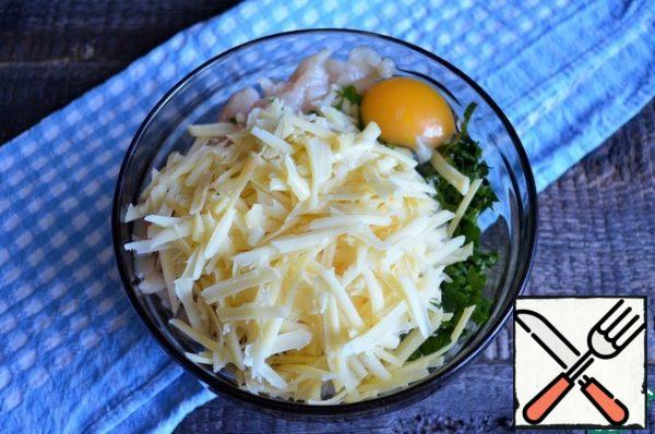 Wash the greens, chop them, and grate the cheese on a coarse grater.