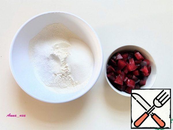 Everything is very simple, easy and fast. Sift the flour, baking powder and baking soda into a large bowl. Add sugar and mix everything together. Wash the plums, dry them with a paper towel and cut them into small pieces.