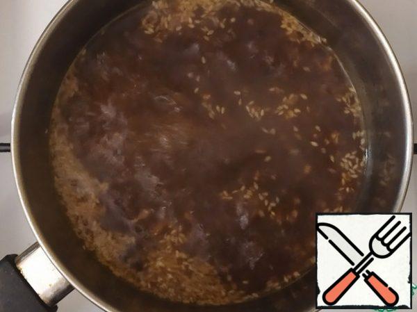 Pour the marinade into a ladle and bring to a boil.