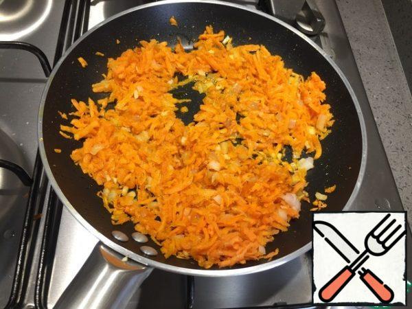 Fry the onion, garlic, and carrot in olive oil until Golden brown.