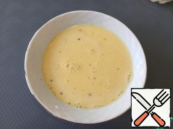 Add the milk to the egg mixture and stir.