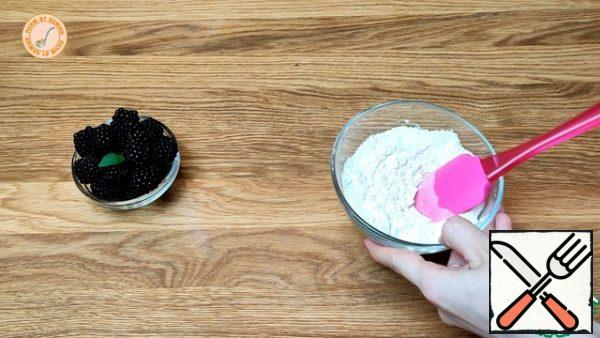 Add baking powder to the flour and mix.