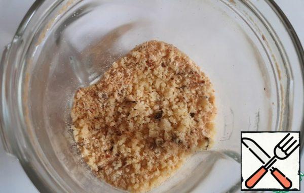 Toasted bread is crushed into crumbs in a convenient way.