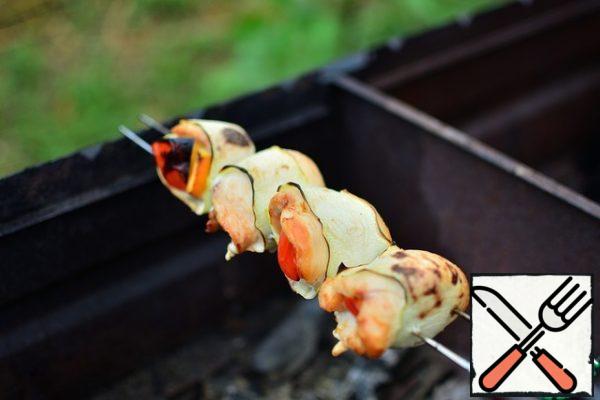 Cook over moderately hot coals, turning, for 8 minutes, until soft.