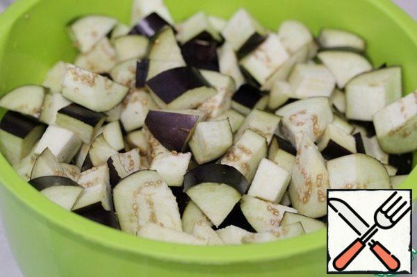 Cut eggplant into cubes.