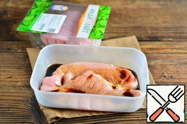 Marinate the Turkey in soy sauce while the cabbage is being boiled and the pickled onions are being prepared.