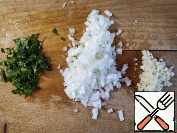 Finely chop the onion, garlic, and parsley.