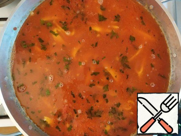 After a minute, add the broth, saffron, salt and pepper. Bring to a boil and let simmer for 1-2 minutes.