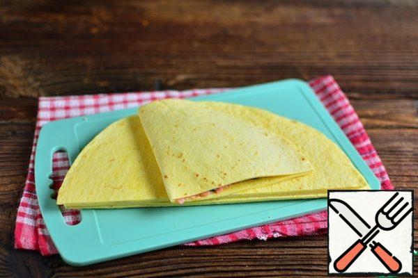 Close the second half of the tortilla and press.
