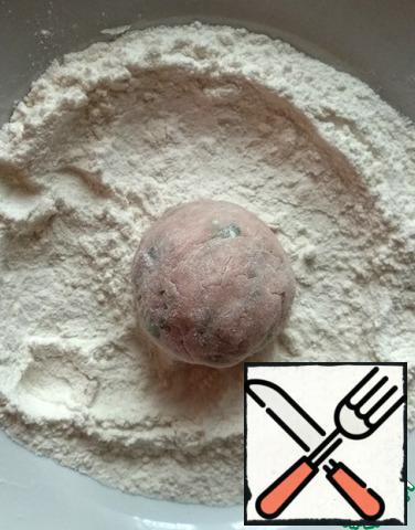 Roll each ball in flour (2 tablespoons).