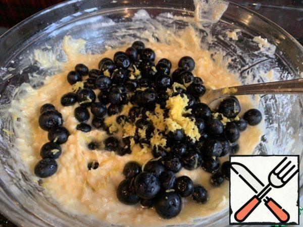 Stir in the blueberries, zest and lemon juice.