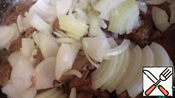 Add thinly chopped onions.
