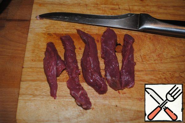 Then we cut into thin strips.