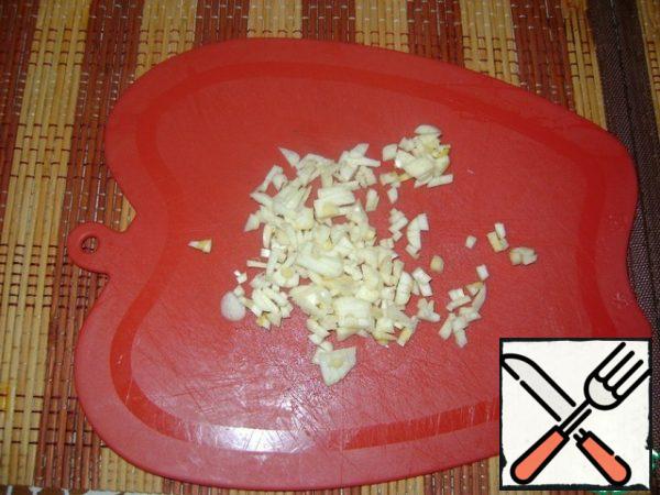 Finely chop the garlic.