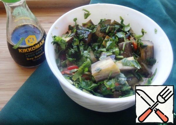 Ready-made eggplants are slightly cooled, cut into fairly large slices and immediately seasoned with marinade. Everything! The dish is ready!