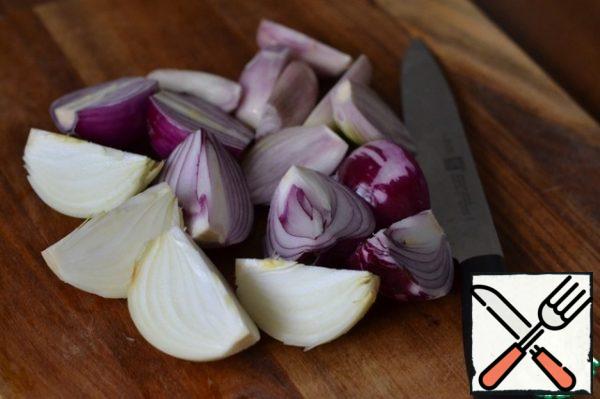 Peel all varieties of onions and cut in half.