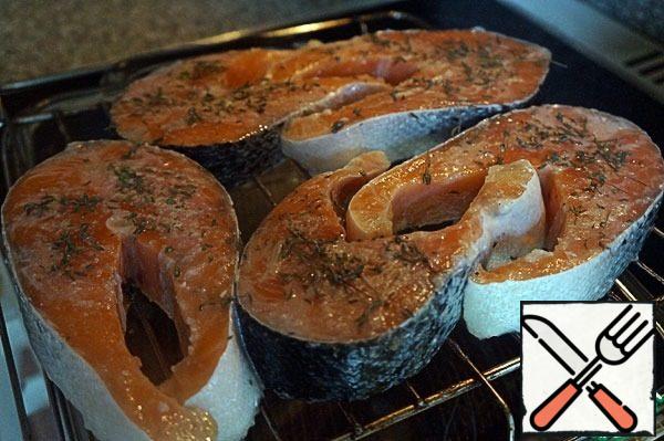 Place the steaks on the grill, and place a few sprigs of thyme on each one without the stem.