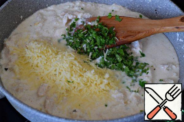 Add the grated cheese and chopped parsley to the pan. Stir and simmer the fillet in the sauce for another couple of minutes.