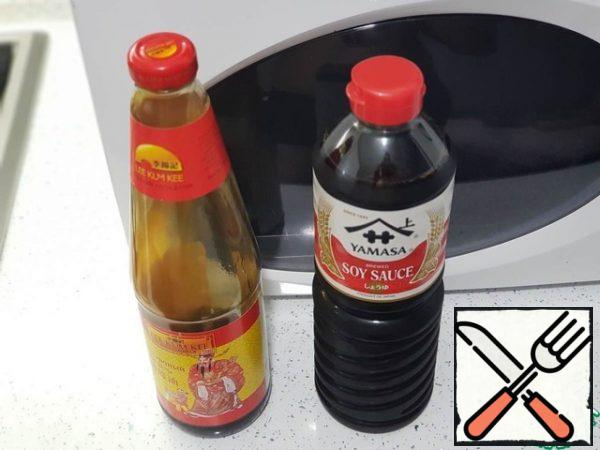 After 5 minutes, add the oyster and soy sauces, mix and fry for a couple more minutes.