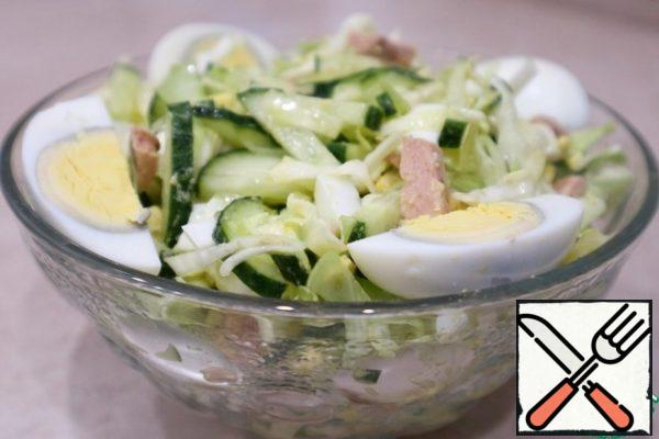 Vegetable salad with cod liver is ready! Enjoy your meal!