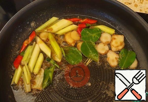 Heat the spices in the oil (except garlic). Add honey.