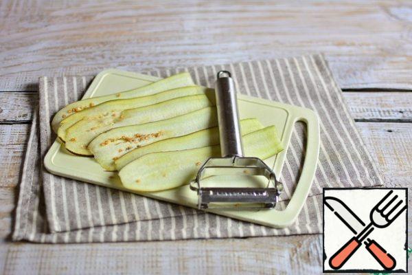 Cut the eggplant into thin slices.