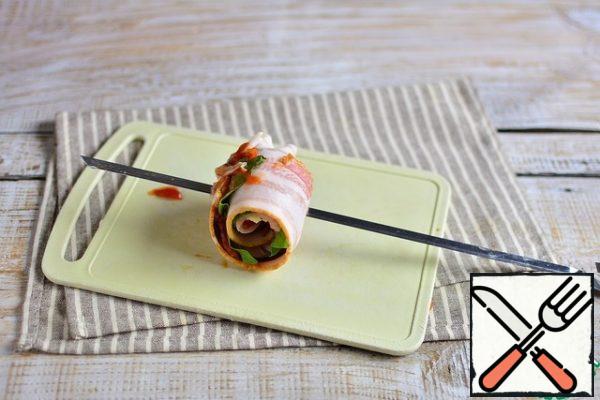 Wrap tightly in a roll and string on a skewer.