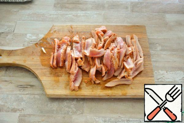 Remove the Turkey from the grill and cut into strips.
