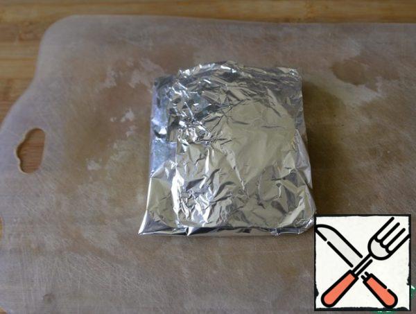 Fold the foil envelope.
Bake in the coals or on the grill for 20 minutes.
You can bake at home in the oven at 200 degrees for 30 minutes.