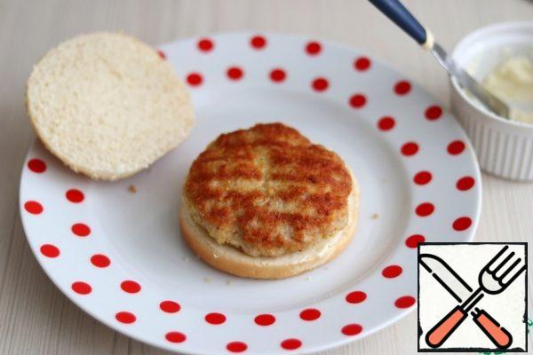 Put the hot Turkey fillet cutlet on the cheese layer. The cheese will melt slightly.
