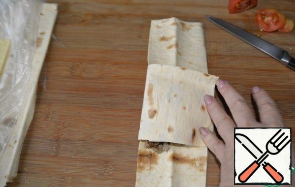 Wrap the bottom ends of the strip tightly up first.