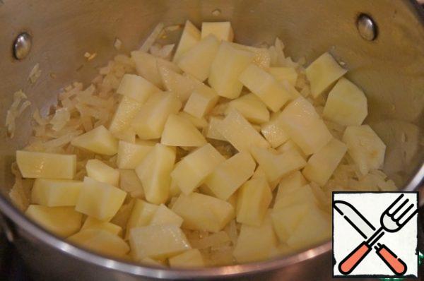 Add the potatoes.