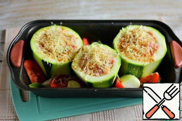 Pour in a glass of water, salt the top, and sprinkle with grated cheese and paprika.