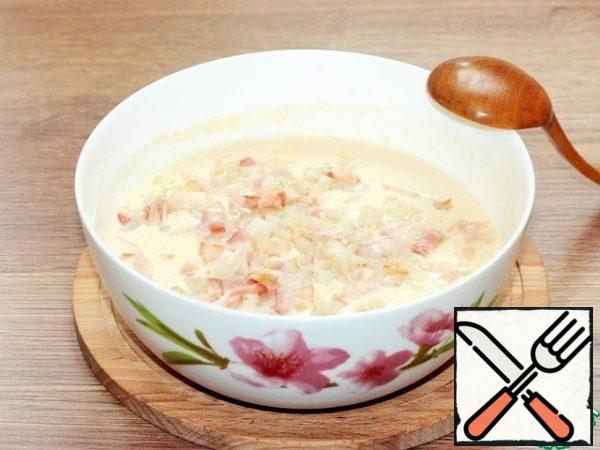 Add the onion and bacon to the bowl, the pressed garlic clove, pepper, salt and mix.