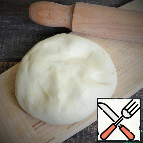 Prepare the dumpling dough, put it in a bag and leave for 30-60 minutes.