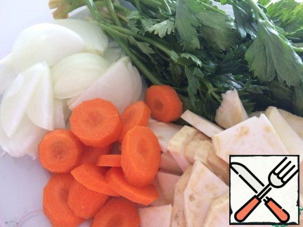 The next day, randomly chop the onion, carrot, celery