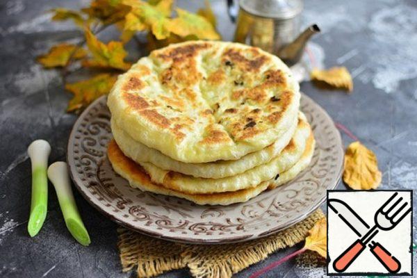 Fried Tortillas with Onions and Cheese Recipe