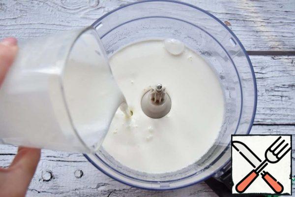 Pour in the yogurt and mix.