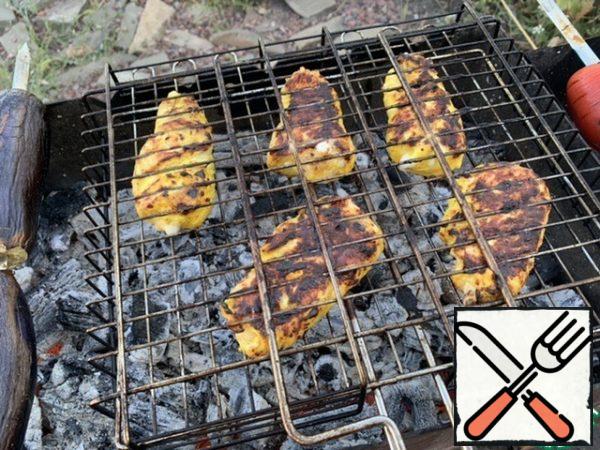 Cook over the coals, about 10-15 minutes, turning the grill frequently, until Golden.
