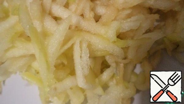 Grate the Apple on a coarse grater.