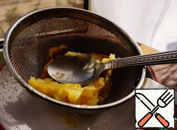 Apple is ground through a sieve.